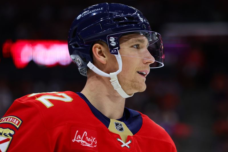 Nov 14, 2024; Sunrise, Florida, USA; Florida Panthers defenseman Gustav Forsling (42) looks on against the New Jersey Devils during the first period at Amerant Bank Arena. Mandatory Credit: Sam Navarro-Imagn Images