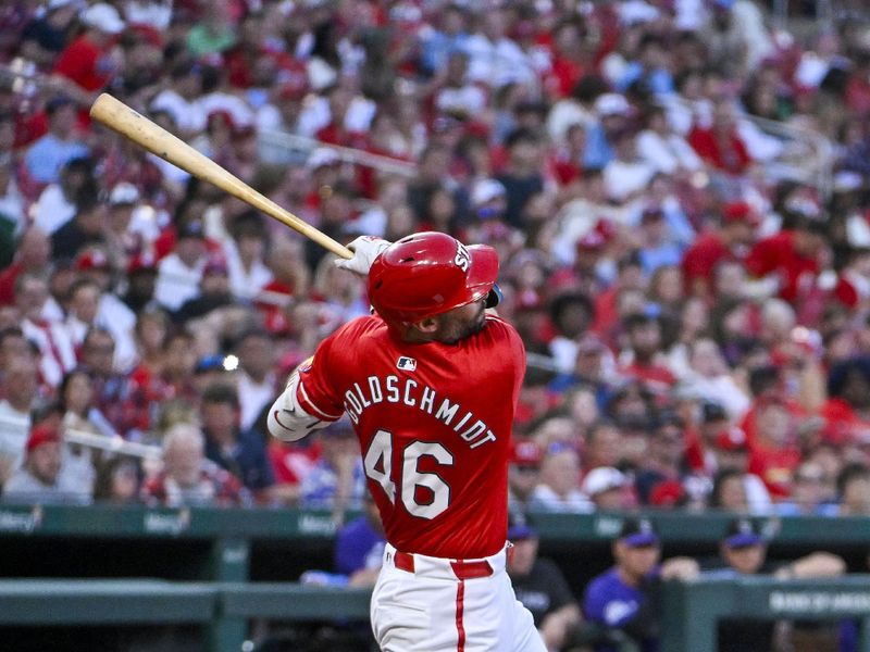 Jun 7, 2024; St. Louis, Missouri, USA;  St. Louis Cardinals first baseman Paul Goldschmidt (46) hits a one run single against the Colorado Rockies during the second inning at Busch Stadium. Mandatory Credit: Jeff Curry-USA TODAY Sports