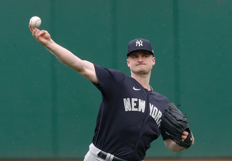 Sep 17, 2023; Pittsburgh, Pennsylvania, USA; New York Yankees pitcher Clarke Schmidt (36) throws in the outfield before the game against the Pittsburgh Pirates at PNC Park. Mandatory Credit: Charles LeClaire-USA TODAY Sports