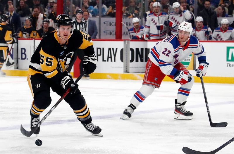 Mar 16, 2024; Pittsburgh, Pennsylvania, USA;  Pittsburgh Penguins center Noel Acciari (55) carries the puck into the offensive zone against the New York Rangers during the first period at PPG Paints Arena. Mandatory Credit: Charles LeClaire-USA TODAY Sports