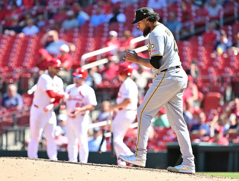 Aug 28, 2025; St. Louis, Missouri, USA; Pittsburgh Pirates pitcher Yohan Ramirez (49) walks back to the mound in a game against the St. Louis Cardinals  at Busch Stadium. Mandatory Credit: Tim Vizer-Imagn Images