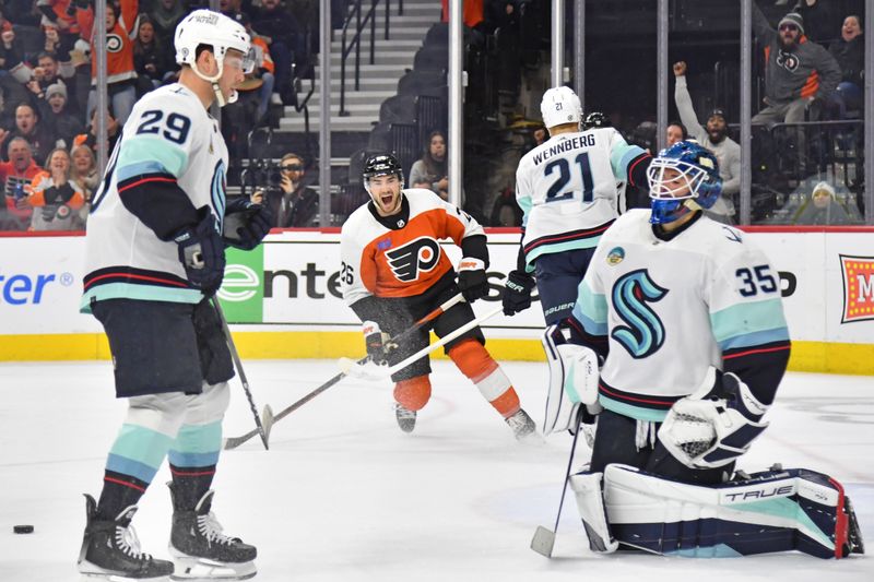 Feb 10, 2024; Philadelphia, Pennsylvania, USA; Philadelphia Flyers defenseman Sean Walker (26) celebrates goal by center Ryan Poehling (25) (not pictured) against the Seattle Kraken during the first period at Wells Fargo Center. Mandatory Credit: Eric Hartline-USA TODAY Sports