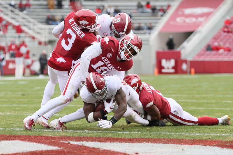 Dec 12, 2020; Fayetteville, Arkansas, USA;  Alabama Crimson Tide running back Brian Robinson Jr. (4) scores a touchdown in the second quarter against the Arkansas Razorbacks at Donald W. Reynolds Razorback Stadium. Mandatory Credit: Nelson Chenault-USA TODAY Sports