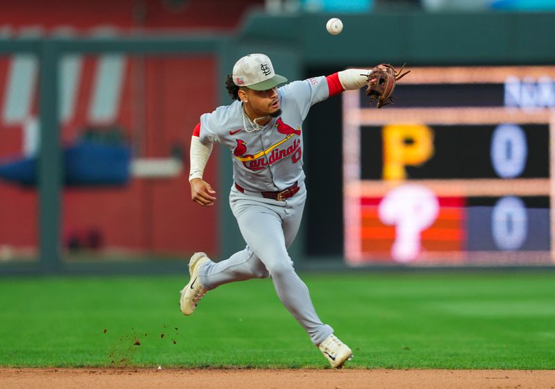 May 16, 2025; Kansas City, Missouri, USA; St. Louis Cardinals shortstop Masyn Winn (0) is unable to field a ground ball during the fourth inning against the Kansas City Royals at Kauffman Stadium. Mandatory Credit: Jay Biggerstaff-Imagn Images
