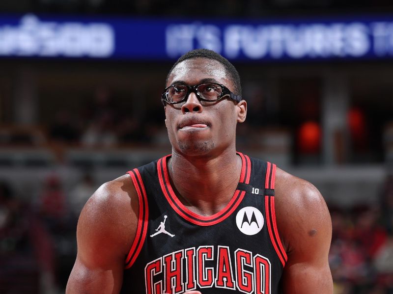 CHICAGO, IL - DECEMBER 13: Jalen Smith #7 of the Chicago Bulls shoots a free throw during the game against the Charlotte Hornets on December 13, 2024 at United Center in Chicago, Illinois. NOTE TO USER: User expressly acknowledges and agrees that, by downloading and or using this photograph, User is consenting to the terms and conditions of the Getty Images License Agreement. Mandatory Copyright Notice: Copyright 2024 NBAE (Photo by Jeff Haynes/NBAE via Getty Images)