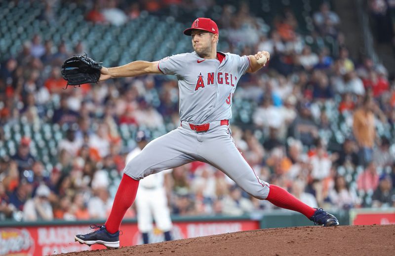 May 22, 2024; Houston, Texas, USA; Los Angeles Angels starting pitcher Tyler Anderson (31) delivers a pitch during the first inning against the Houston Astros at Minute Maid Park. Mandatory Credit: Troy Taormina-USA TODAY Sports