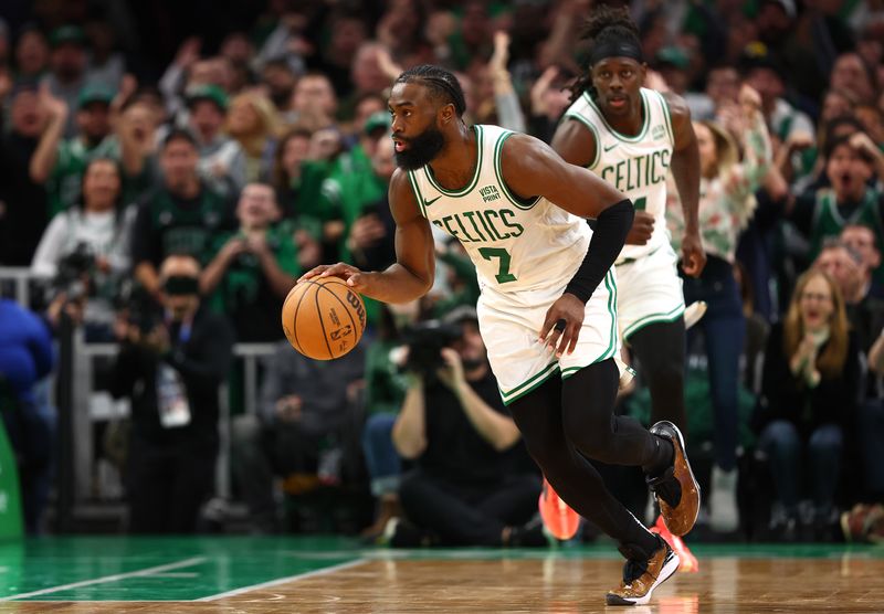 BOSTON, MASSACHUSETTS - JANUARY 10: Jaylen Brown #7 of the Boston Celtics dribbles downcourt against the Minnesota Timberwolves  at TD Garden on January 10, 2024 in Boston, Massachusetts. The Celtics defeat the Timberwolves 127-120 in overtime. NOTE TO USER: User expressly acknowledges and agrees that, by downloading and or using this photograph, user is consenting to the terms and conditions of the Getty Images License Agreement.  (Photo by Maddie Meyer/Getty Images)