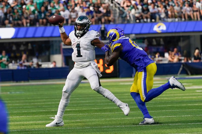 Philadelphia Eagles quarterback Jalen Hurts throws the ball during the second half of an NFL football game against the Los Angeles Rams, Sunday, Oct. 8, 2023, in Inglewood, Calif. (AP Photo/Gregory Bull)