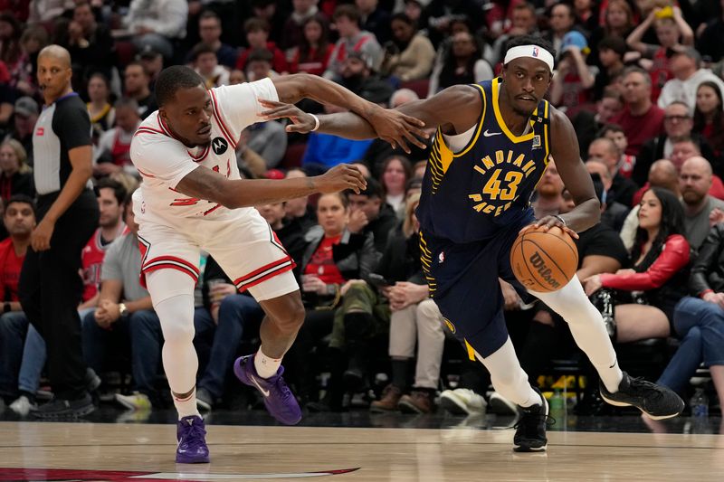 CHICAGO, ILLINOIS - MARCH 27: Pascal Siakam #43 of the Indiana Pacers dribbles the ball against Javonte Green #24 of the Chicago Bulls during the second half at the United Center on March 27, 2024 in Chicago, Illinois. NOTE TO USER: User expressly acknowledges and agrees that, by downloading and or using this photograph, User is consenting to the terms and conditions of the Getty Images License Agreement. (Photo by Patrick McDermott/Getty Images)