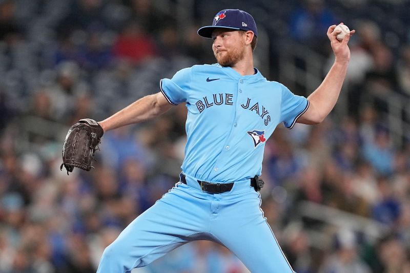 Apr 30, 2025; Toronto, Ontario, CAN; Toronto Blue Jays pitcher Brendon Little (54) pitches to the Boston Red Sox during the third inning at Rogers Centre. Mandatory Credit: John E. Sokolowski-Imagn Images