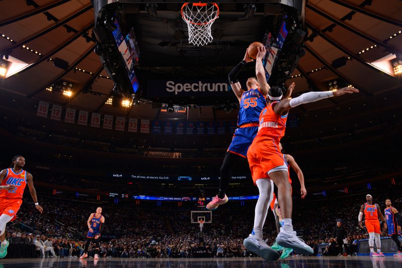 NEW YORK, NY - MARCH 31: Isaiah Hartenstein #55 of the New York Knicks drives to the basket during the game against the Oklahoma City Thunder on March 31, 2024 at Madison Square Garden in New York City, New York.  NOTE TO USER: User expressly acknowledges and agrees that, by downloading and or using this photograph, User is consenting to the terms and conditions of the Getty Images License Agreement. Mandatory Copyright Notice: Copyright 2024 NBAE  (Photo by Jesse D. Garrabrant/NBAE via Getty Images)