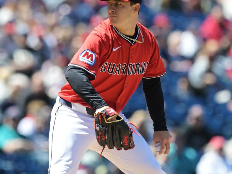 Apr 27, 2025; Cleveland, Ohio, USA; Cleveland Guardians starting pitcher Logan Allen (26) throws a pitch during the first inning against the Boston Red Sox at Progressive Field. Mandatory Credit: Ken Blaze-Imagn Images