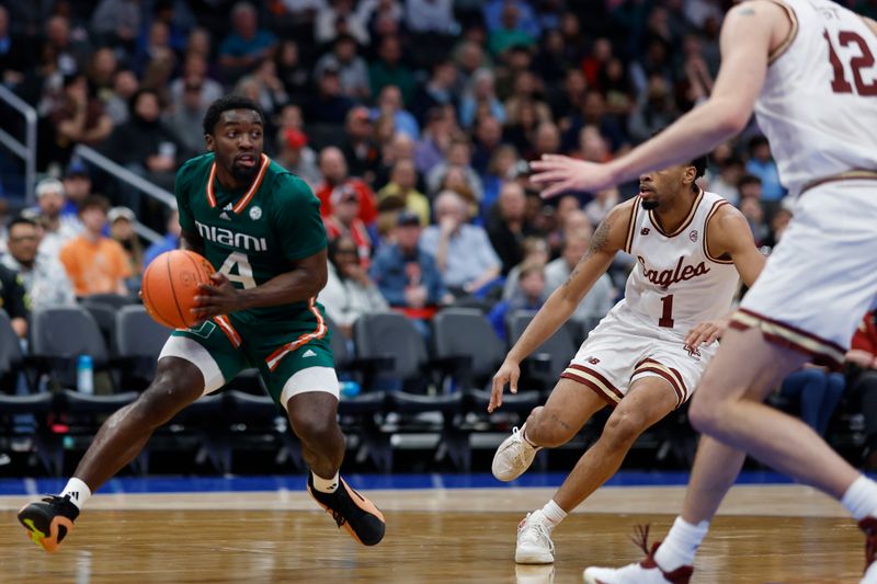 Mar 12, 2024; Washington, D.C., USA; Miami (Fl) Hurricanes guard Bensley Joseph (4) drives to the basket as Boston College Eagles guard Claudell Harris Jr. (1) chases in the first half at Capital One Arena. Mandatory Credit: Geoff Burke-USA TODAY Sports