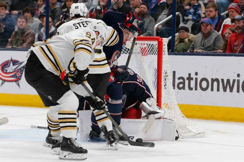 Jan 2, 2024; Columbus, Ohio, USA; Boston Bruins center Jakub Lauko (94) lifts a backhand shot on goal during the second period against the Columbus Blue Jackets at Nationwide Arena. Mandatory Credit: Russell LaBounty-USA TODAY Sports