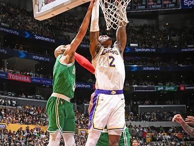 LOS ANGELES, CA - DECEMBER 25: Jarred Vanderbilt #2 of the Los Angeles Lakers dunks the ball during the game against the Boston Celtics on December 25, 2023 at Crypto.Com Arena in Los Angeles, California. NOTE TO USER: User expressly acknowledges and agrees that, by downloading and/or using this Photograph, user is consenting to the terms and conditions of the Getty Images License Agreement. Mandatory Copyright Notice: Copyright 2023 NBAE (Photo by Andrew D. Bernstein/NBAE via Getty Images)