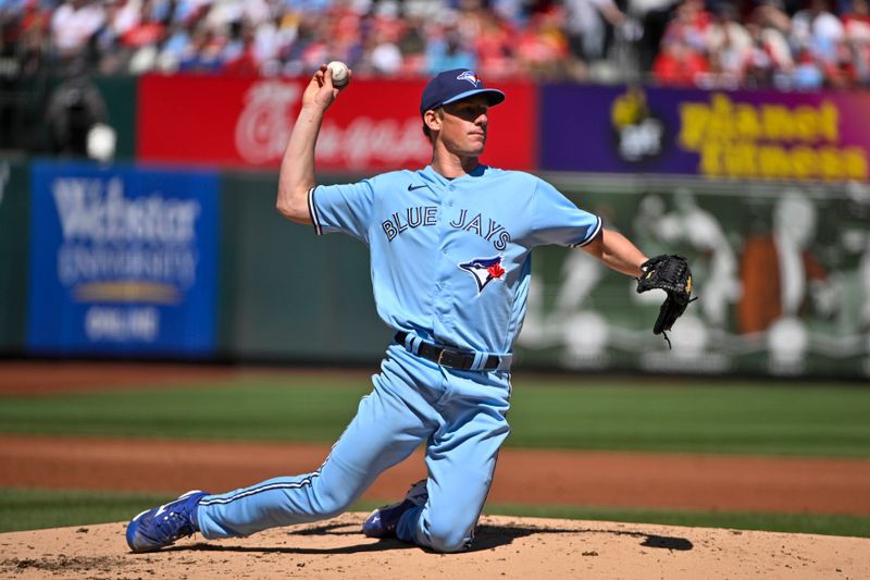 Apr 2, 2023; St. Louis, Missouri, USA;  Toronto Blue Jays starting pitcher Chris Bassitt (40) throws from his knees to first base after fielding a ground ball against the St. Louis Cardinals during the second inning at Busch Stadium. Mandatory Credit: Jeff Curry-USA TODAY Sports