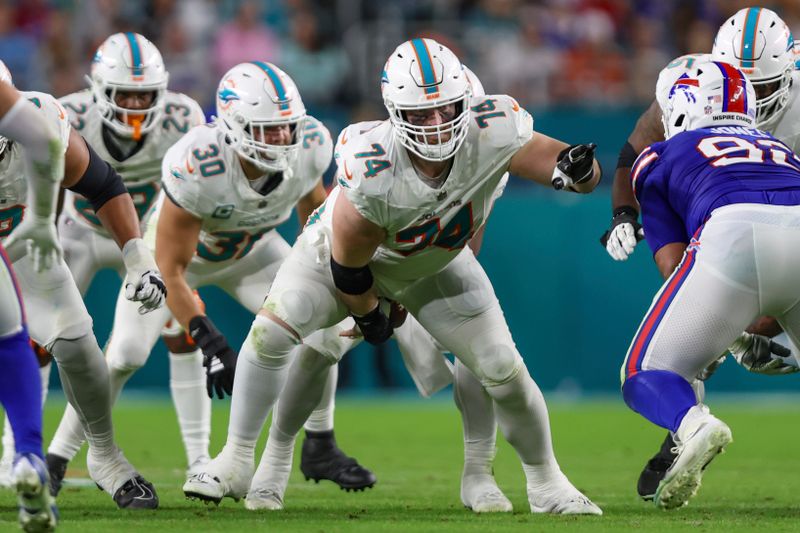 Miami Dolphins offensive tackle Liam Eichenberg (74) in action during an NFL football game against the Buffalo Bills, Sunday, Jan. 7, 2024, in Miami Gardens, Fla. The Bills defeated the Dolphins 21-14. (AP Photo/Gary McCullough)