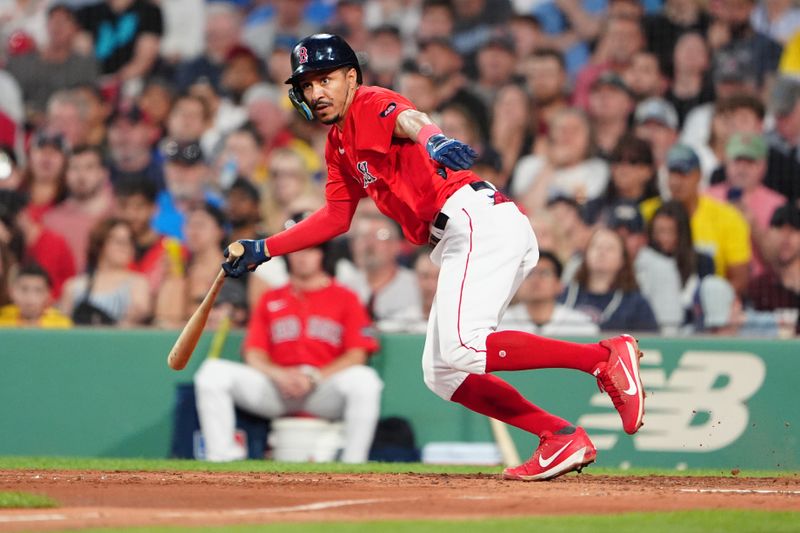 May 24, 2024; Boston, Massachusetts, USA; Boston Red Sox shortstop David Hamilton (70) hits an RBI double against the Milwaukee Brewers during the fourth inning at Fenway Park. Mandatory Credit: Gregory Fisher-USA TODAY Sports