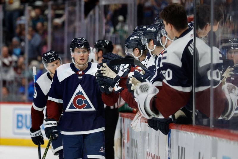 Apr 9, 2024; Denver, Colorado, USA; Colorado Avalanche left wing Artturi Lehkonen (62) celebrates with the bench after his goal in the first period against the Minnesota Wild at Ball Arena. Mandatory Credit: Isaiah J. Downing-USA TODAY Sports