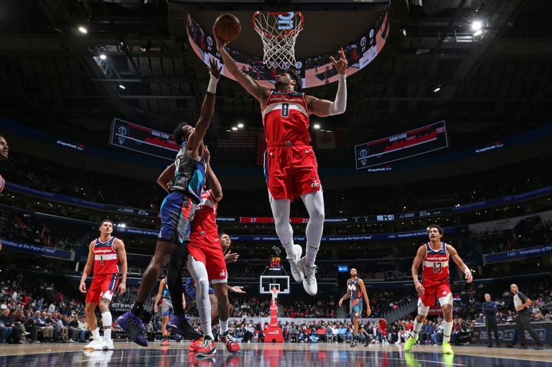 WASHINGTON, DC -? MARCH 27: Deni Avdija #8 of the Washington Wizards grabs a rebound during the game against the Brooklyn Nets  on March 27, 2024 at Capital One Arena in Washington, DC. NOTE TO USER: User expressly acknowledges and agrees that, by downloading and or using this Photograph, user is consenting to the terms and conditions of the Getty Images License Agreement. Mandatory Copyright Notice: Copyright 2024 NBAE (Photo by Stephen Gosling/NBAE via Getty Images)