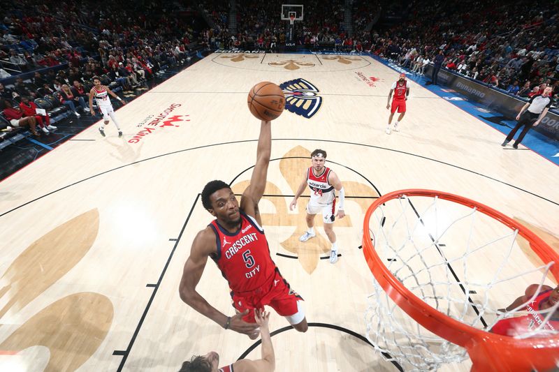 NEW ORLEANS, LA - FEBRUARY 14: Herb Jones #5 of the New Orleans Pelicans drives to the basket during the game against the Washington Wizards on February 14, 2024 at the Smoothie King Center in New Orleans, Louisiana. NOTE TO USER: User expressly acknowledges and agrees that, by downloading and or using this Photograph, user is consenting to the terms and conditions of the Getty Images License Agreement. Mandatory Copyright Notice: Copyright 2024 NBAE (Photo by Layne Murdoch Jr./NBAE via Getty Images)