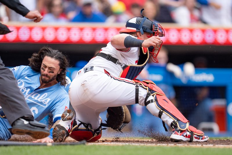 May 24, 2025; Minneapolis, Minnesota, USA; Kansas City Royals second base Jonathan India (6) scores as Minnesota Twins catcher Christian Vazquez (8) catches the ball off the dirt in the fifth inning at Target Field. Mandatory Credit: Matt Blewett-Imagn Images