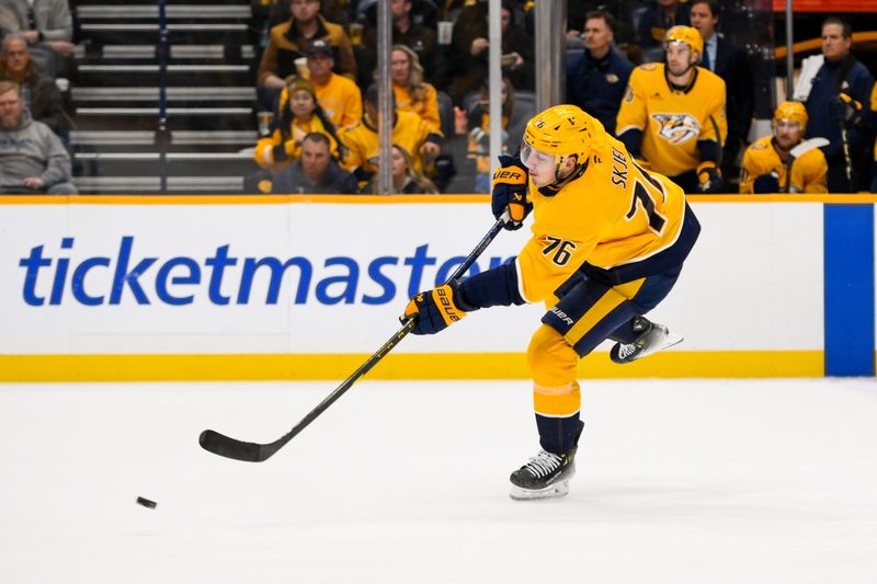 Nov 29, 2024; Nashville, Tennessee, USA;  Nashville Predators defenseman Brady Skjei (76) takes a shot on goal against the Tampa Bay Lightning during the second period at Bridgestone Arena. Mandatory Credit: Steve Roberts-Imagn Images