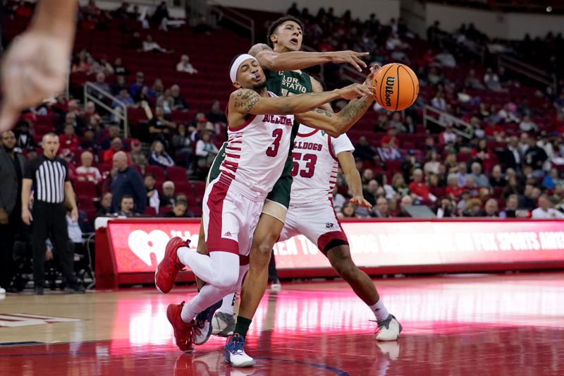 Feb 3, 2024; Fresno, California, USA; Colorado State Rams guard Nique Clifford (10) is fouled by Fresno State Bulldogs guard Isaiah Hill (3) in the first half at the Save Mart Center. Mandatory Credit: Cary Edmondson-USA TODAY Sports