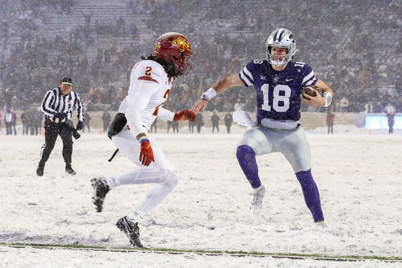 Nov 25, 2023; Manhattan, Kansas, USA; Kansas State Wildcats quarterback Will Howard (18) looks for room to run against Iowa State Cyclones defensive back T.J. Tampa (2) during the third quarter at Bill Snyder Family Football Stadium. Mandatory Credit: Scott Sewell-USA TODAY Sports