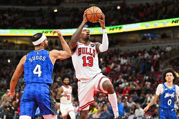 CHICAGO, ILLINOIS - NOVEMBER 15:  Torrey Craig #13 of the Chicago Bulls controls the ball against the Orlando Magic on November 15, 2023 at United Center in Chicago, Illinois.   NOTE TO USER: User expressly acknowledges and agrees that, by downloading and or using this photograph, User is consenting to the terms and conditions of the Getty Images License Agreement.  (Photo by Jamie Sabau/Getty Images)