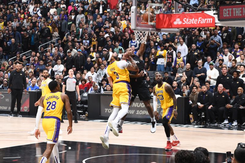 LOS ANGELES, CA - FEBRUARY 28: Kawhi Leonard #2 of the LA Clippers drives to the basket during the game against the Los Angeles Lakers on February 28, 2024 at Crypto.Com Arena in Los Angeles, California. NOTE TO USER: User expressly acknowledges and agrees that, by downloading and/or using this Photograph, user is consenting to the terms and conditions of the Getty Images License Agreement. Mandatory Copyright Notice: Copyright 2024 NBAE (Photo by Andrew D. Bernstein/NBAE via Getty Images)