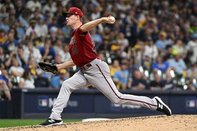 Oct 3, 2023; Milwaukee, Wisconsin, USA; Arizona Diamondbacks relief pitcher Joe Mantiply (35) pitches in the third inning against the Milwaukee Brewers during game one of the Wildcard series for the 2023 MLB playoffs at American Family Field. Mandatory Credit: Michael McLoone-USA TODAY Sports