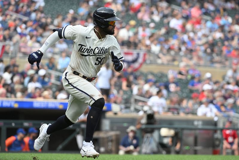 Sep 10, 2023; Minneapolis, Minnesota, USA; Minnesota Twins left fielder Willi Castro (50) hits a triple against the New York Mets in the seventh inning at Target Field. Mandatory Credit: Michael McLoone-USA TODAY Sports