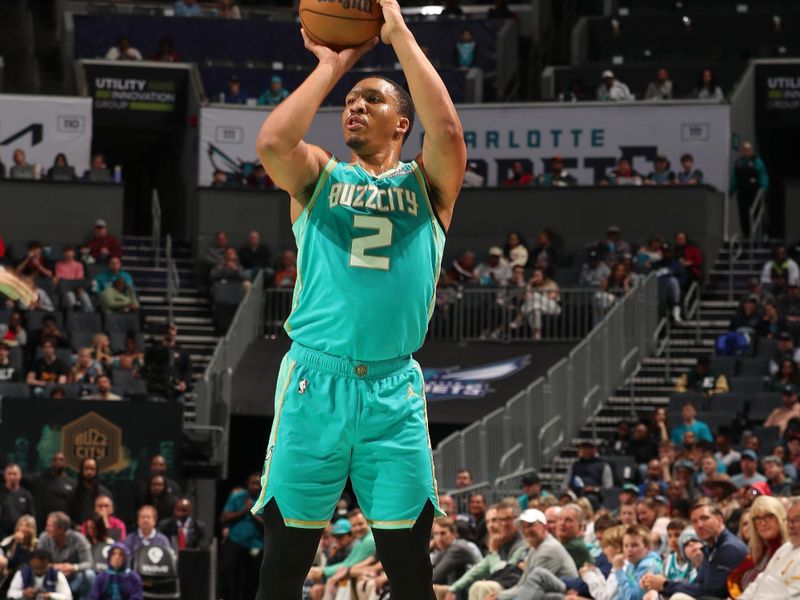 CHARLOTTE, NC - MARCH 27: Grant Williams #2 of the Charlotte Hornets shoots a 3-point basket during the game on March 27, 2024 at Spectrum Center in Charlotte, North Carolina. NOTE TO USER: User expressly acknowledges and agrees that, by downloading and or using this photograph, User is consenting to the terms and conditions of the Getty Images License Agreement. Mandatory Copyright Notice: Copyright 2024 NBAE (Photo by Kent Smith/NBAE via Getty Images)