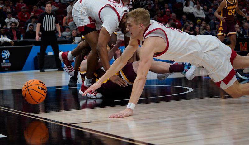 Mar 8, 2023; Chicago, IL, USA; Nebraska Cornhuskers guard Sam Griesel (5) dives for a loose ball against the Minnesota Golden Gophers during the second half at United Center. Mandatory Credit: David Banks-USA TODAY Sports