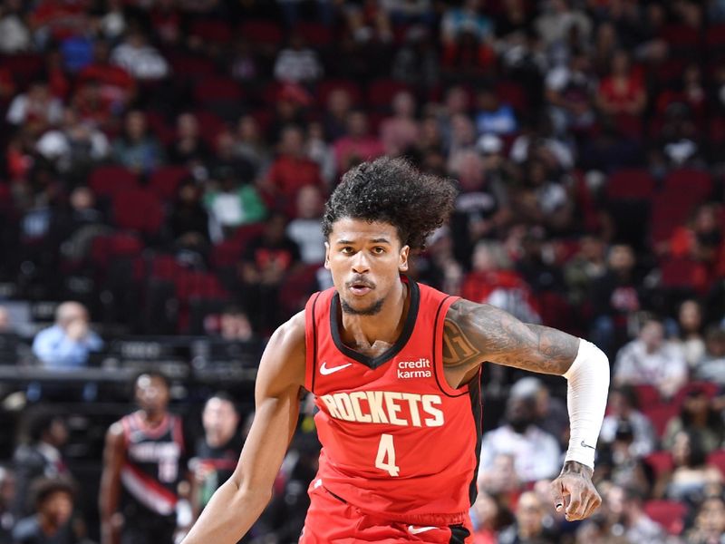 HOUSTON, TX - MARCH 25: Jalen Green #4 of the Houston Rockets handles the ball during the game against the Portland Trail Blazers on March 25, 2024 at the Toyota Center in Houston, Texas. NOTE TO USER: User expressly acknowledges and agrees that, by downloading and or using this photograph, User is consenting to the terms and conditions of the Getty Images License Agreement. Mandatory Copyright Notice: Copyright 2024 NBAE (Photo by Logan Riely/NBAE via Getty Images)