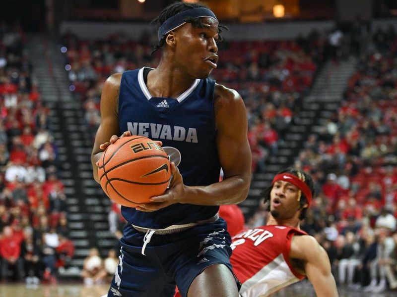 Jan 28, 2023; Las Vegas, Nevada, USA; Nevada Wolf Pack guard Kenan Blackshear (13) handles the ball near UNLV Runnin' Rebels guard Justin Webster (2) in the first half at Thomas & Mack Center. Mandatory Credit: Candice Ward-USA TODAY Sports