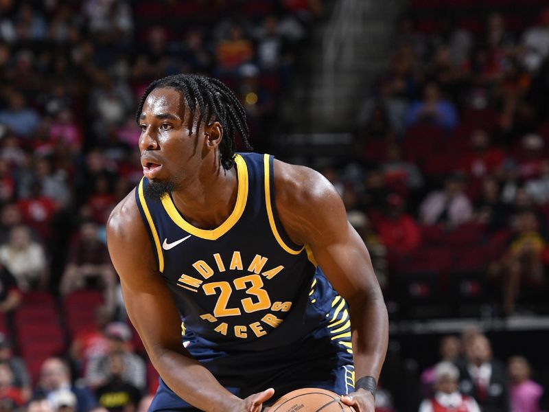 HOUSTON, TX - OCTOBER 10: Aaron Nesmith #23 of the Indiana Pacers looks to pass the ball during the game against the Houston Rockets on October 10, 2023 at the Toyota Center in Houston, TX. NOTE TO USER: User expressly acknowledges and agrees that, by downloading and or using this photograph, User is consenting to the terms and conditions of the Getty Images License Agreement. Mandatory Copyright Notice: Copyright 2023 NBAE (Photo by Logan Riely/NBAE via Getty Images)