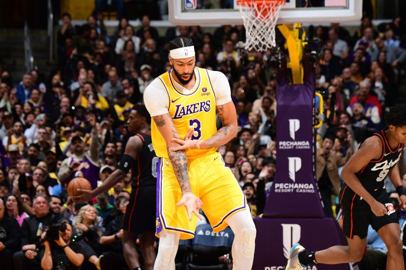 LOS ANGELES, CA - February 13: Anthony Davis #3 of the Los Angeles Lakers celebrates during the game against the Detroit Pistons on February 13, 2024 at Crypto.Com Arena in Los Angeles, California. NOTE TO USER: User expressly acknowledges and agrees that, by downloading and/or using this Photograph, user is consenting to the terms and conditions of the Getty Images License Agreement. Mandatory Copyright Notice: Copyright 2024 NBAE (Photo by Adam Pantozzi/NBAE via Getty Images)