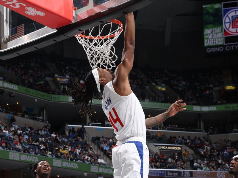 MEMPHIS, TN - FEBRUARY 23: Terance Mann #14 of the LA Clippers drives to the basket during the game against the Memphis Grizzlies on February 23, 2024 at FedExForum in Memphis, Tennessee. NOTE TO USER: User expressly acknowledges and agrees that, by downloading and or using this photograph, User is consenting to the terms and conditions of the Getty Images License Agreement. Mandatory Copyright Notice: Copyright 2024 NBAE (Photo by Joe Murphy/NBAE via Getty Images)