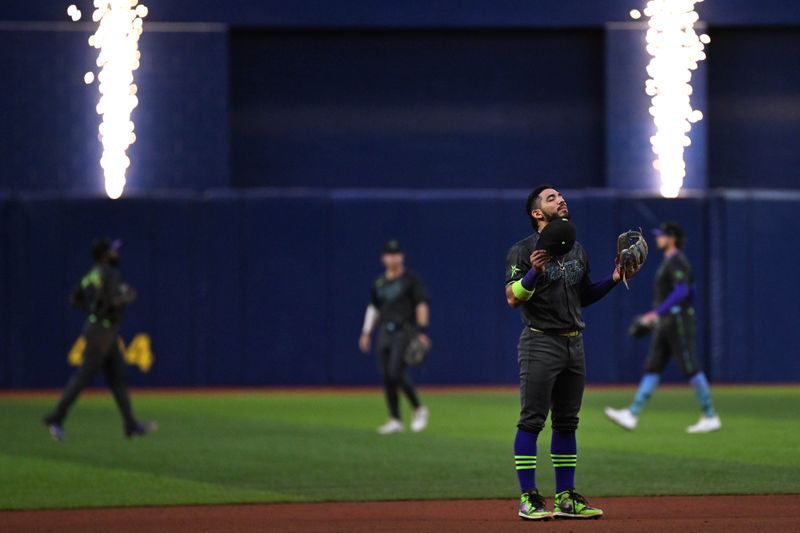 May 7, 2024; St. Petersburg, Florida, USA; Tampa Bay Rays shortstop Jose Caballero (7) celebrates after the last out against the Chicago White Sox  at Tropicana Field. Mandatory Credit: Jonathan Dyer-USA TODAY Sports