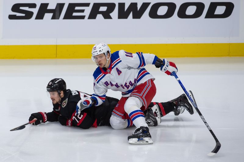 Jan 27, 2024; Ottawa, Ontario, CAN; Ottawa Senators defenseman Thomas Chabot (72) collides with New York Rangers left wing Artemi Panarin (10) in the third period at the Canadian Tire Centre. Mandatory Credit: Marc DesRosiers-USA TODAY Sports