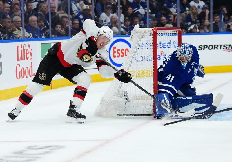 Apr 29, 2025; Toronto, Ontario, CAN; Ottawa Senators left wing Brady Tkachuk (7) tries a wrap around shot on Toronto Maple Leafs goaltender Anthony Stolarz (41) in the second period during game five of the first round of the 2025 Stanley Cup Playoffs at Scotiabank Arena. Mandatory Credit: Nick Turchiaro-Imagn Images