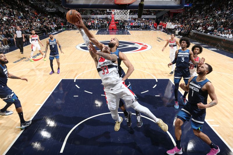 WASHINGTON, DC -? JANUARY 24: Rudy Gobert #27 of the Minnesota Timberwolves blocks the shot by Kyle Kuzma #33 of the Washington Wizards during the game on January 24, 2024 at Capital One Arena in Washington, DC. NOTE TO USER: User expressly acknowledges and agrees that, by downloading and or using this Photograph, user is consenting to the terms and conditions of the Getty Images License Agreement. Mandatory Copyright Notice: Copyright 2024 NBAE (Photo by Stephen Gosling/NBAE via Getty Images)