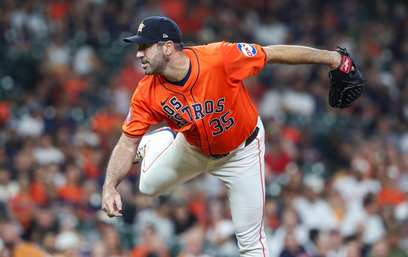 Sep 20, 2024; Houston, Texas, USA; Houston Astros starting pitcher Justin Verlander (35) delivers a pitch during the first inning against the Los Angeles Angels at Minute Maid Park. Mandatory Credit: Troy Taormina-Imagn Images