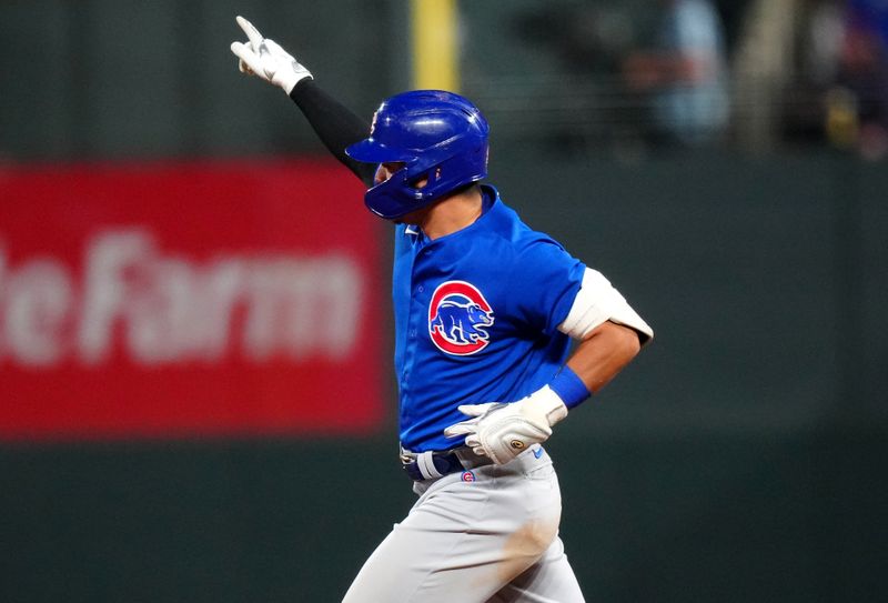 Sep 12, 2023; Denver, Colorado, USA; Chicago Cubs right fielder Seiya Suzuki (27) runs off a two run home run in the sixth inning against the Colorado Rockies at Coors Field. Mandatory Credit: Ron Chenoy-USA TODAY Sports