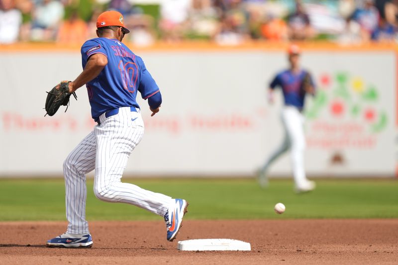 Mar 1, 2026; Port St. Lucie, Florida, USA;  New York Mets second baseman Marcus Semien (10) misses the toss for an attempt at a double play, allowing Houston Astros left fielder Joey Loperfido to advance to third base in the second inning at Clover Park. Mandatory Credit: Jim Rassol-Imagn Images