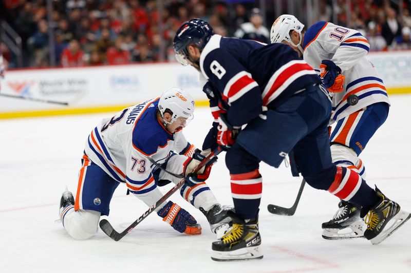 Nov 24, 2023; Washington, District of Columbia, USA; Edmonton Oilers defenseman Vincent Desharnais (73) blows the shot of Washington Capitals left wing Alex Ovechkin (8) in the third period at Capital One Arena. Mandatory Credit: Geoff Burke-USA TODAY Sports