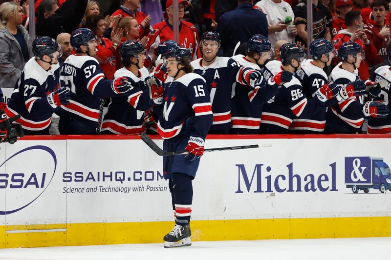 Mar 9, 2024; Washington, District of Columbia, USA; Washington Capitals left wing Sonny Milano (15) celebrates with teammates after scoring a goal against the Chicago Blackhawks in the second period at Capital One Arena. Mandatory Credit: Geoff Burke-USA TODAY Sports