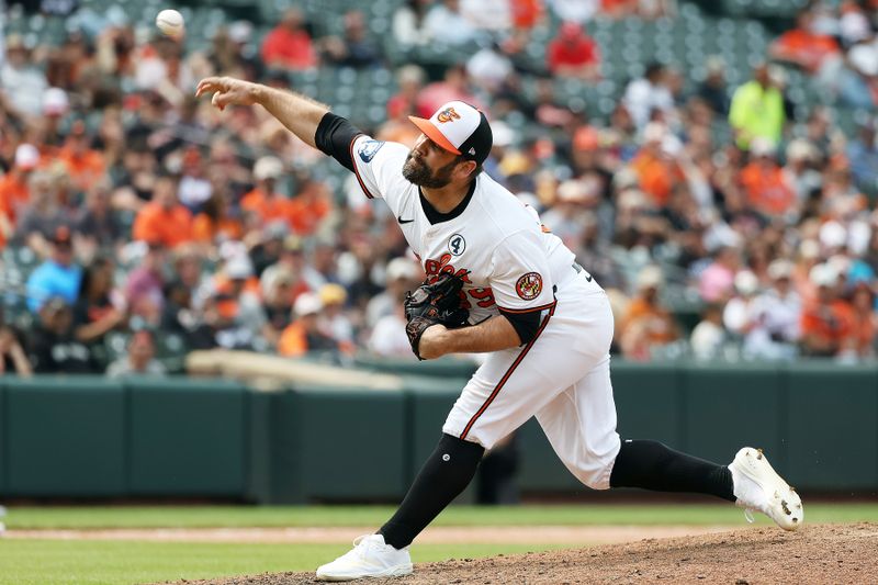 Jun 1, 2025; Baltimore, Maryland, USA; Baltimore Orioles pitcher Andrew Kittredge (39) throws during the eighth inning against the Chicago White Sox at Oriole Park at Camden Yards. Mandatory Credit: Daniel Kucin Jr.-Imagn Images